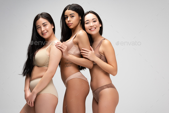 Three Attractive Underwear Models Wearing Bra and Panties Stock