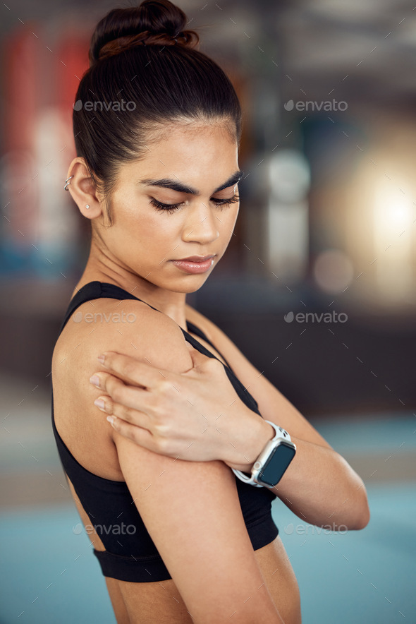 Injury, hurt and shoulder pain for a female athlete holding her painful