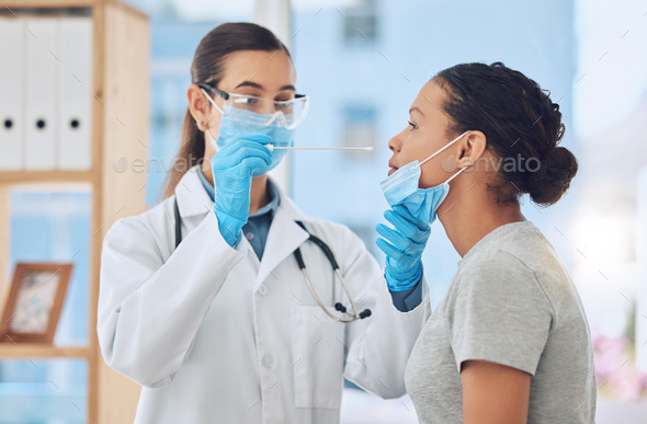 Medical doctor doing a covid test on patient by taking a sample with nose swab in her office. Healt