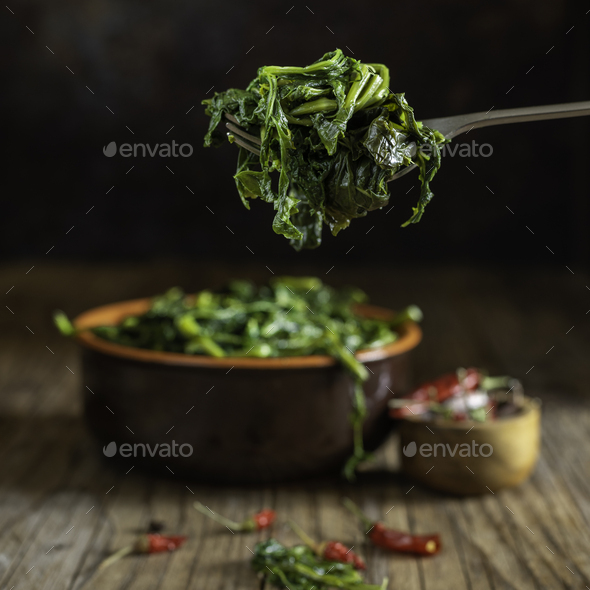 Cup of fried broccoli called friarielli typical neapolitan food - Stock Photo - Images