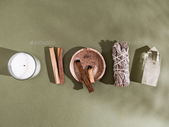 Collection items for spiritual cleansing - sage bundle, palo santo incense sticks
