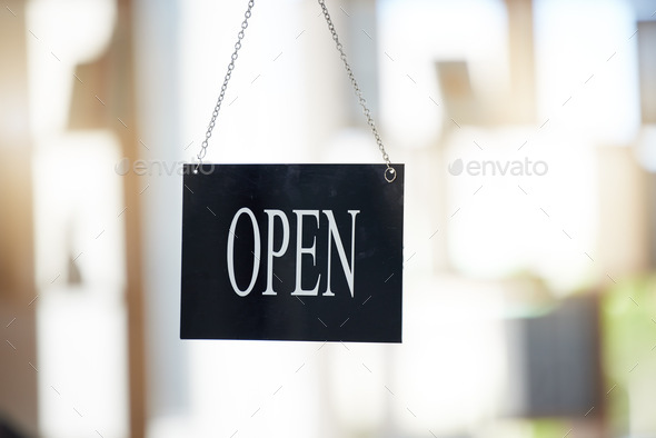 Small business, cafe and advertising with open sign for marketing, board or start of opening hours.