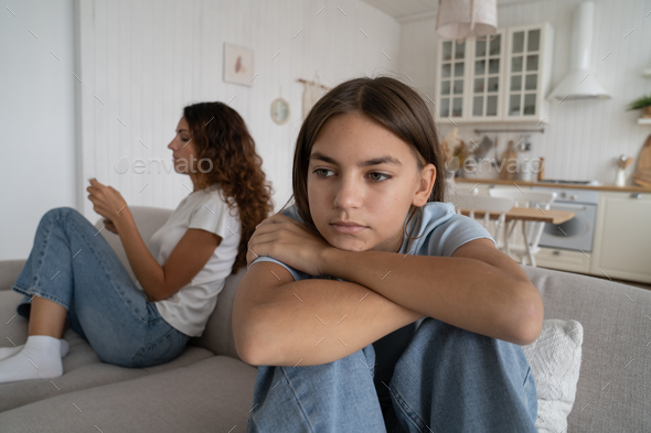 Offended teen girl feeling sad after fight with mother, thinking of conflict argument with mom