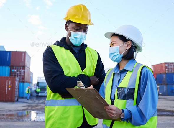 Logistics, shipping and workers with mask for covid safety with a checklist for cargo inventory on