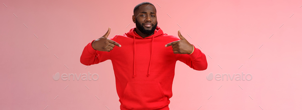 Proud cheeky confident young bearded african american man pointing himself bragging charish praise