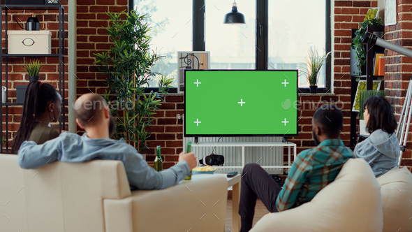 Diverse friends watching tv series on greenscreen template