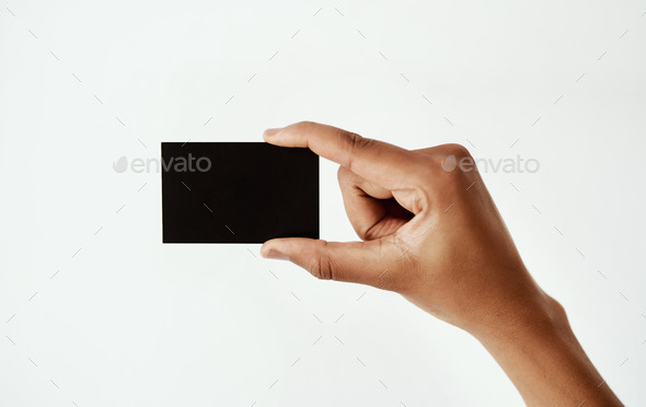 Your brand goes right here. Cropped studio shot of an unrecognizable woman holding a blank card.