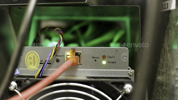 Rear view of an antminer device, bitcoin mining hardware. Stock footage. Close up of professional