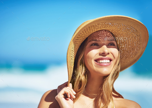 What An Amazing Summers Day Shot Of A Gorgeous Young Woman In A Bikini At The Beach Stock