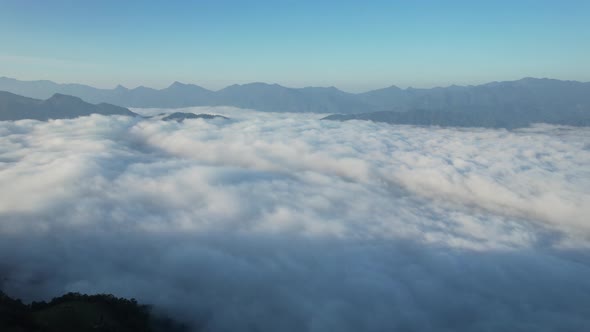 Landscape of mountains peak and with the sea of fog by drone