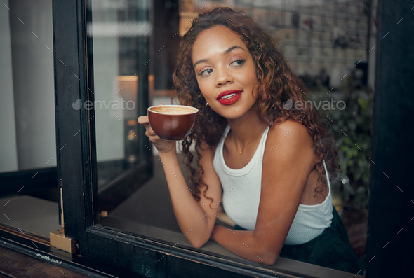 Coffee, cafe and relax with a black woman drinking from a cup at a ...