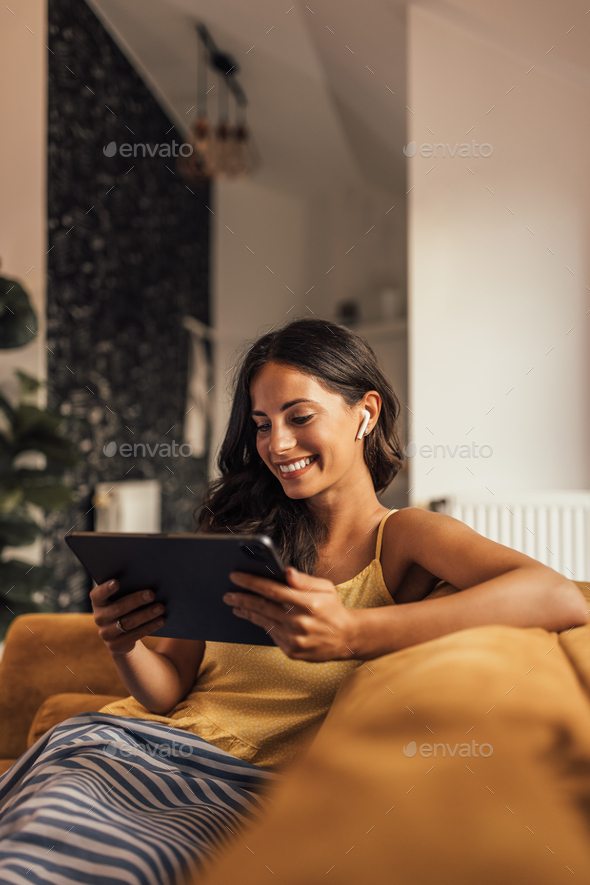Adult woman, downloading new apps. - Stock Photo - Images