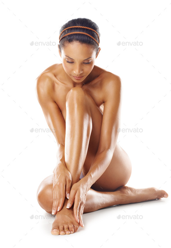 Beauty from head to toe. Studio shot of a young woman with gorgeous skin isolated on white.