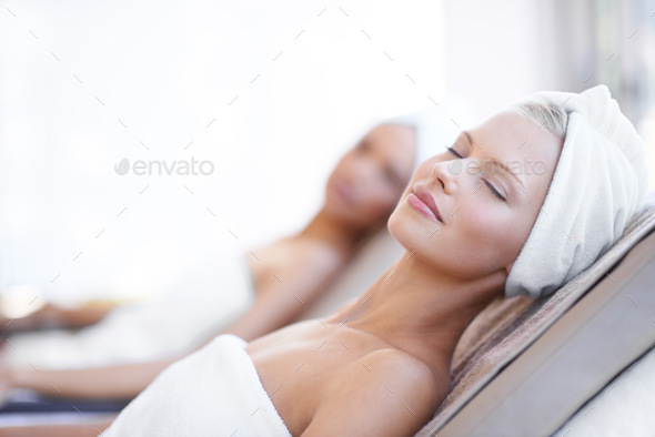 Theres nothing better than a day at the spa. A beautiful young woman relaxing at the beauty spa.