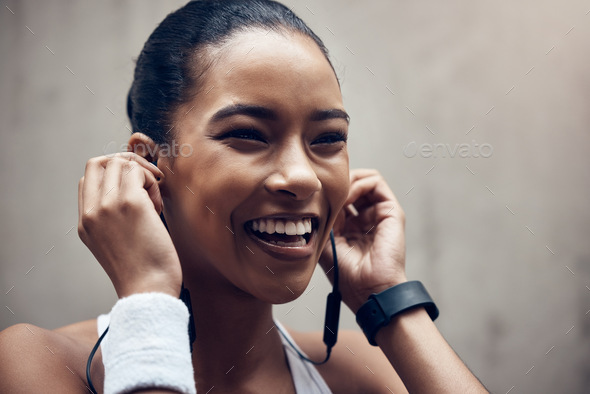 Music, happy woman and city fitness exercise training with online audio motivation speaker. African