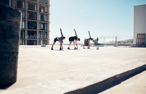 Soccer, sports and fitness with a team stretching on a rooftop court before a game or match outdoor