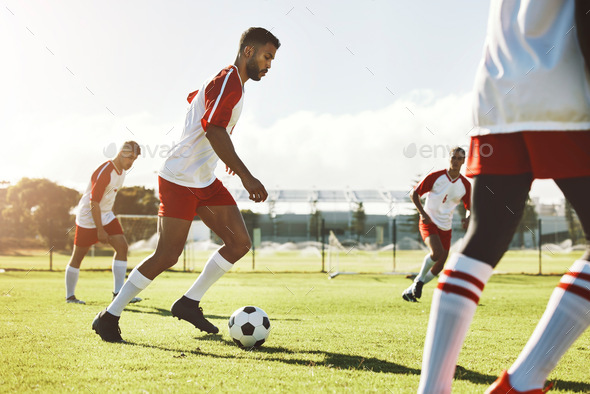 Team sports game, soccer and teamwork of men busy with football collaboration and workout. Fitness, - Stock Photo - Images
