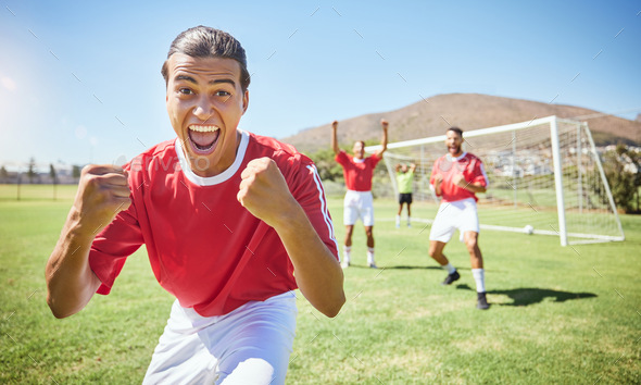 Soccer player, celebrate and winning team with fist in celebration of ...