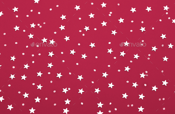 Christmas pattern made of silver stars. New 2023 trending PANTONE 18-1750 Viva Magenta colour - Stock Photo - Images