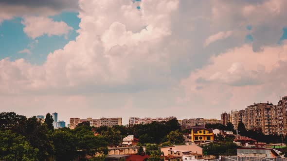 Clouds Moving Fast Over a Residential Area in the City alt