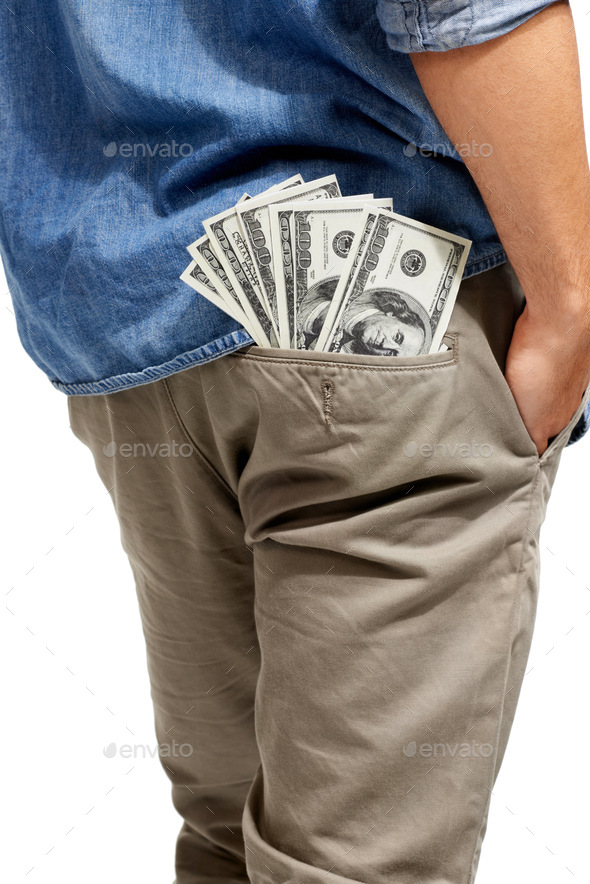 Lots to spend. Cropped image of a wad of cash sticking out of a mans pocket.