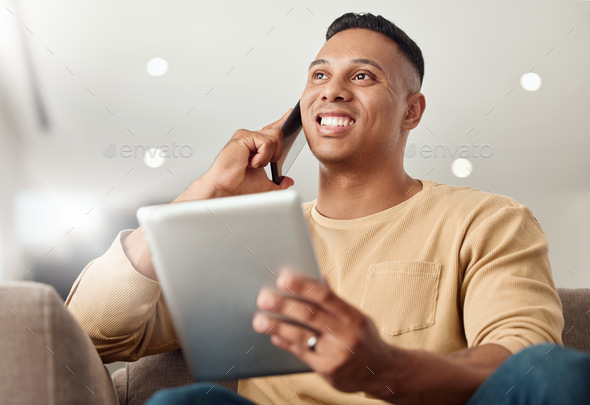 Phone call, tablet and man networking, speaking and working on the internet from the sofa in his ho - Stock Photo - Images