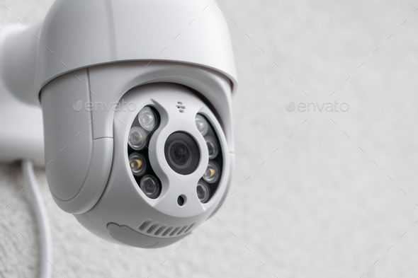 Security CCTV camera in office or shop building for protection against thieves.