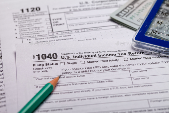 Income tax with instruction. Tax payment and filing concept - Stock Photo - Images