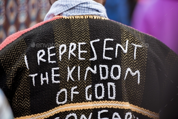 Closeup shot of a person\'s back wearing a coat with \