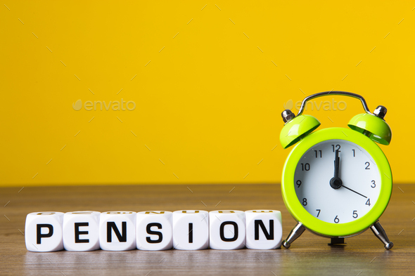 Inscription Pension and alarm clock on yellow background - Stock Photo - Images