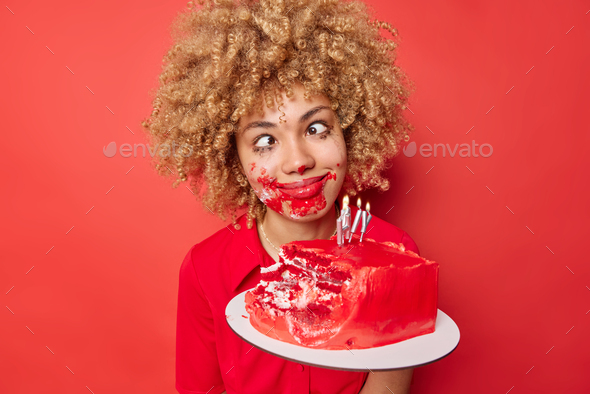 Woman holding pie by face messy Stock Photo by ©alanpoulson 29654053
