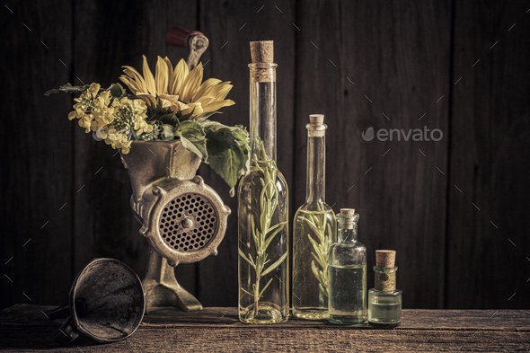 Extraordinary and imaginary virgin oil machine with seeds and sunflower.