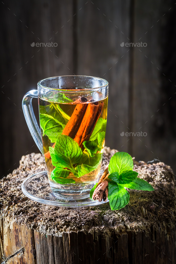 Tea made of green leaves and cinnamon bark Stock Photo by Shaiith PhotoDune
