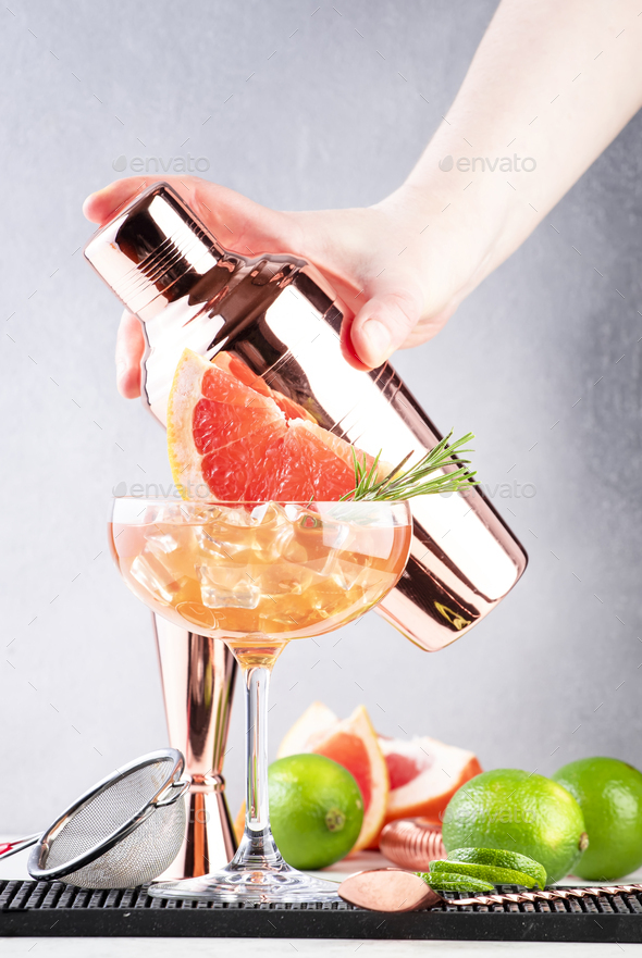 Grapefruit daiquiri alcoholic cocktail with white rum, syrup, fruit