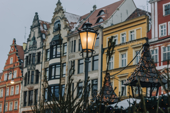 Old city lamp of old town in snow and Christmas time in Wroclaw, Poland - Stock Photo - Images