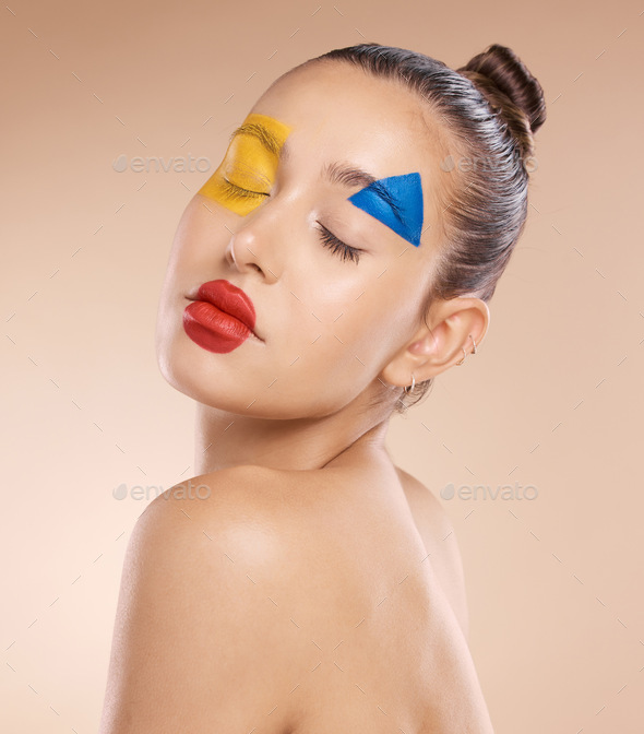 Woman, creative clown makeup on face and close eyes expression. Portrait of beauty cosmetic skincar