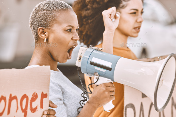 Protest, angry and black woman with a megaphone as leadership for social change, justice and freedo