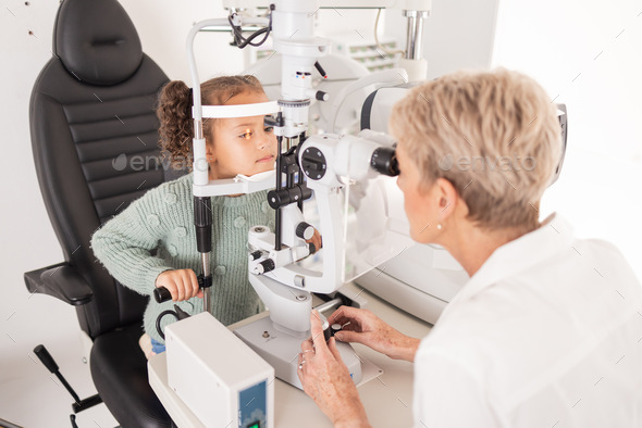 Girl child in eye exam for vision, woman optician checking kids eyes in consultation room and medic