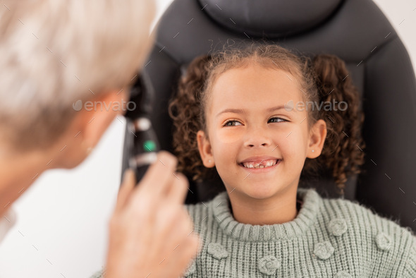 Happy, test and child with eye doctor for eyesight, vision or retina testing at an optometrist appo - Stock Photo - Images