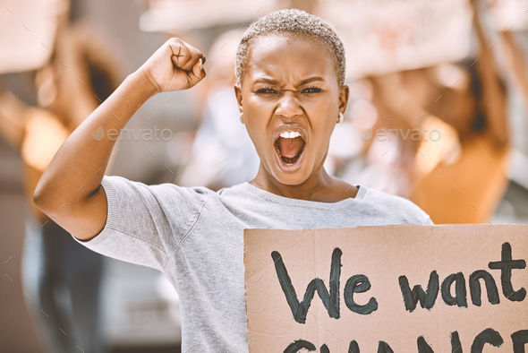 Power, motivation and scream protest of a black woman protesting for social change. Portrait of a y