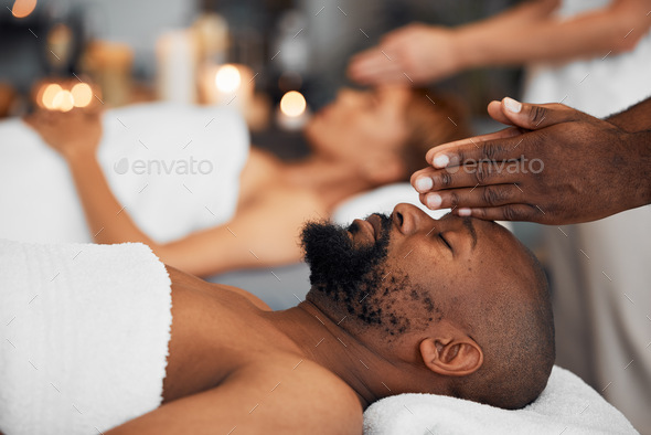 Black man, massage and peaceful being calm, relax and clear mind being stress free, release tension
