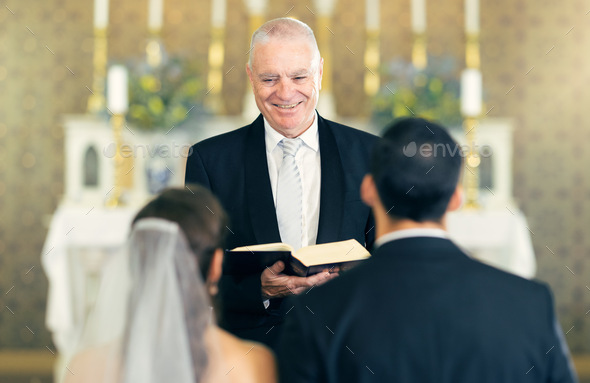 Wedding, priest and couple at the altar saying vows while getting ...