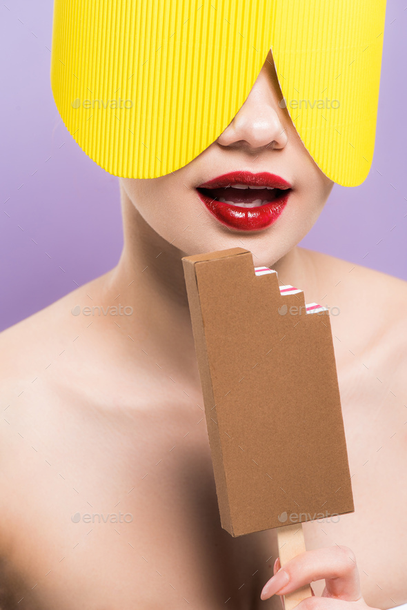 naked woman with red lips holding cardboard chocolate ice cream isolated on purple