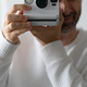 Man with Polaroid camera - PhotoDune Item for Sale