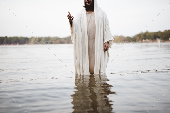 Biblical scene - of Jesus Christ landing a hand for help while standing ...