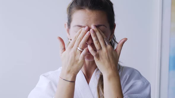 Lady Does Facial Massage Morning Routine