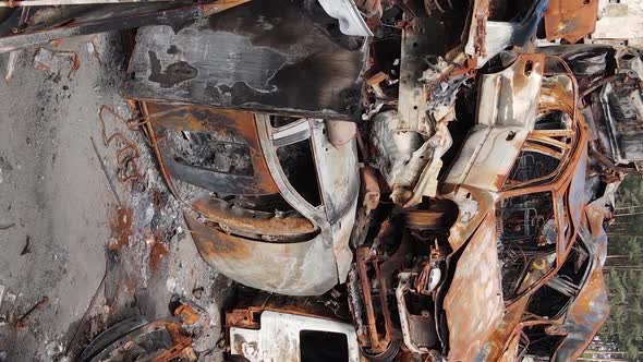 Vertical Video of Destroyed and Shot Cars in the City of Irpin Ukraine alt