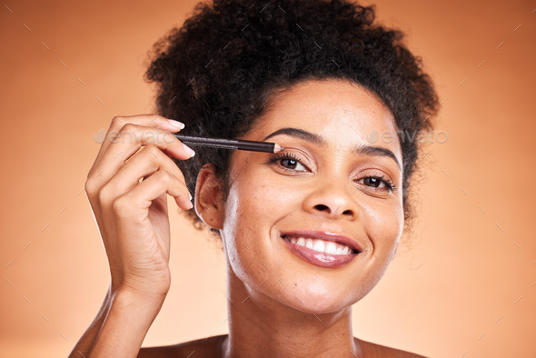 Eyeliner, beauty and portrait of a black woman doing a cosmetic makeup routine in the studio. Cosme