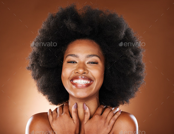 Hug, makeup and black woman with self love, happy and smile for beauty against a brown studio backg