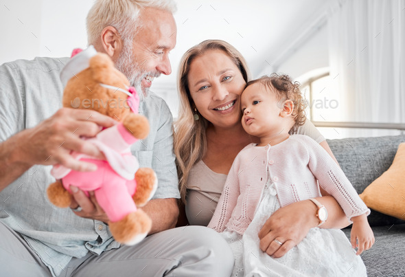 Children, family and teddy bear with a girl and grandparents playing on the sofa during a visit in